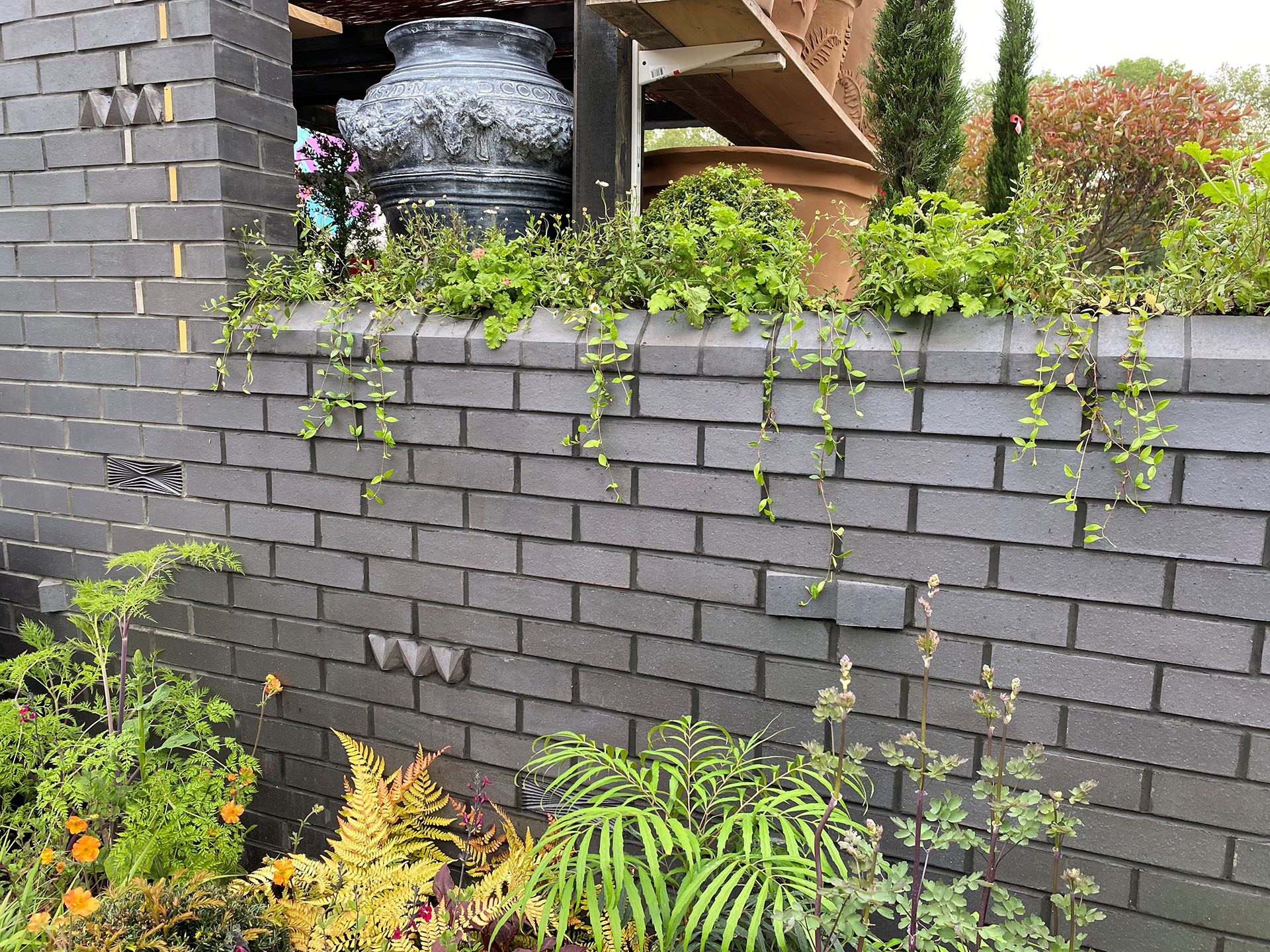 Ketley planter bricks add greenery to a Staffordshire blue wall at RHS Chelsea 2024